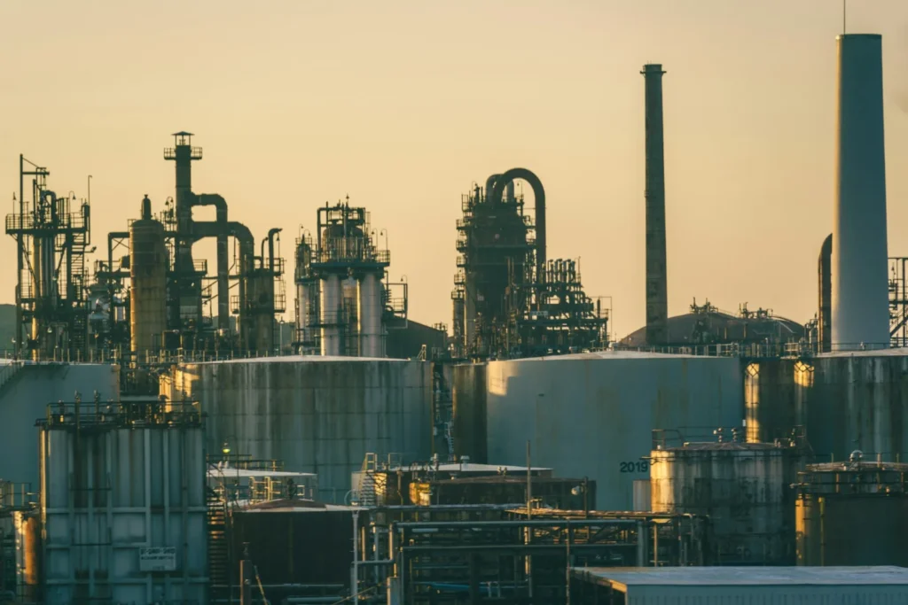 Refinery process units and storage tanks at golden hour